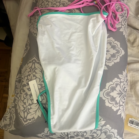 Living Life One Piece in White
Lovers and Friends swim Brand New with tags - Picture 5 of 6
